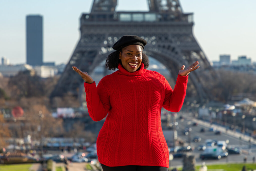 tyra traveling in paris as a travel agent 