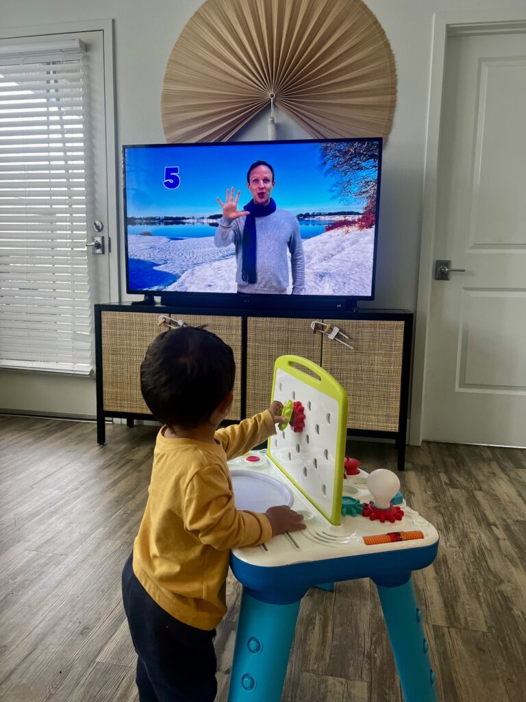 toddler engaging in screen time 